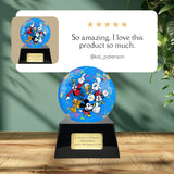 Memorials4u blue sphere urn with Mickey Mouse, Minnie, Goofy, Donald & Pluto. Glossy black base with plaque.