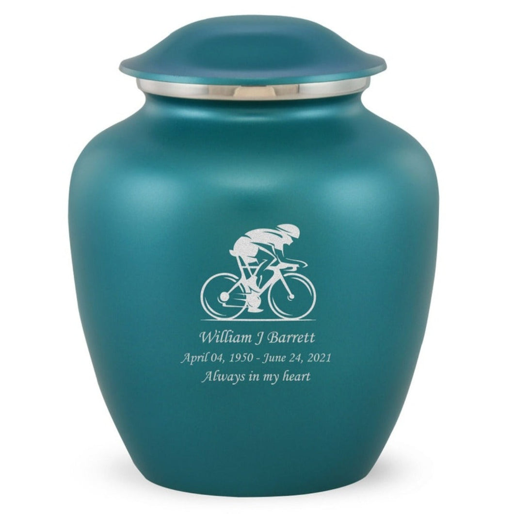 Grace Bicyclist Adult Cremation Urn in Teal, Grace Bicyclist Adult Custom Engraved Urns for Ashes in Teal, Embrace Bicyclist Adult Cremation Urn in Teal, Embrace Bicyclist Adult Urn for Ashes in Teal, Embrace Bicyclist Cremation Urn in Teal, Embrace Bicyclist Urn for Ashes in Teal, Grace Bicyclist Urn for Ashes in Teal, Grace Bicyclist Cremation Urn in Teal - Memorials4u